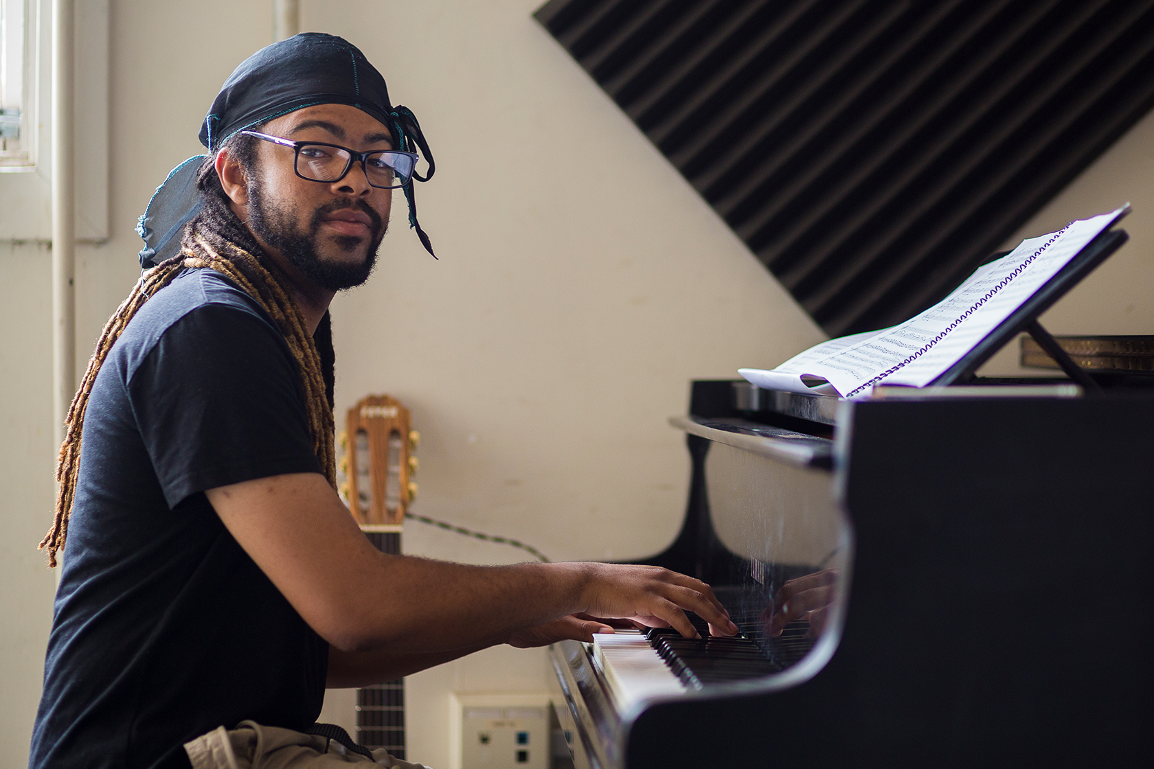 Student composing at the piano